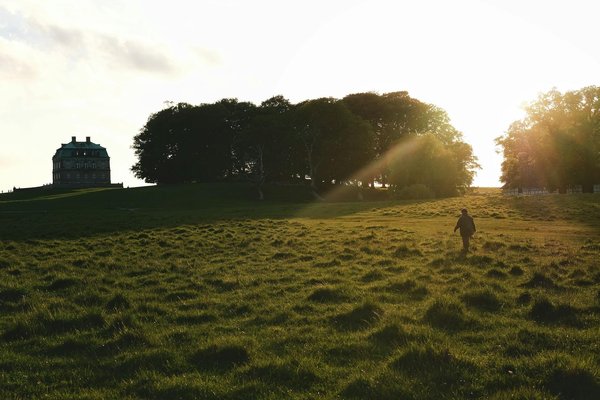 How can you explore the ancient Roman roads of the UK through guided hiking tours?